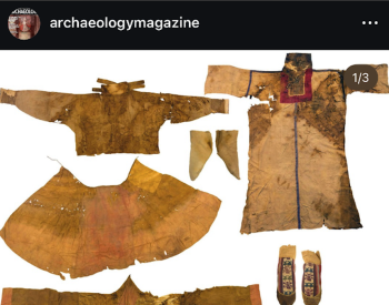 Screenshot of an Instagram post from @archaeologymagazine, with a photo of several pieces of old clothing
